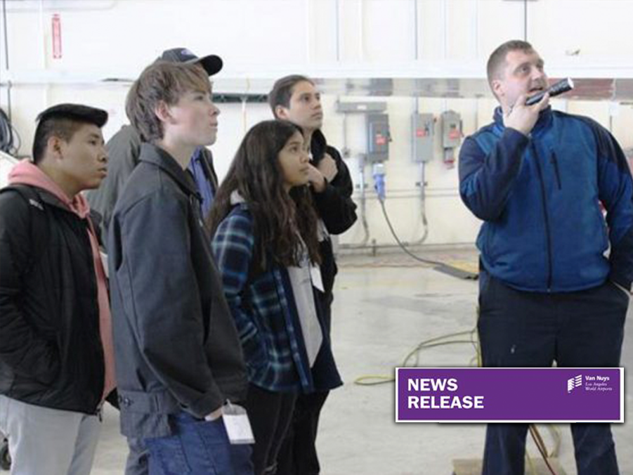 Job Shadow Day Photo of Kids in Hangar by Airplane